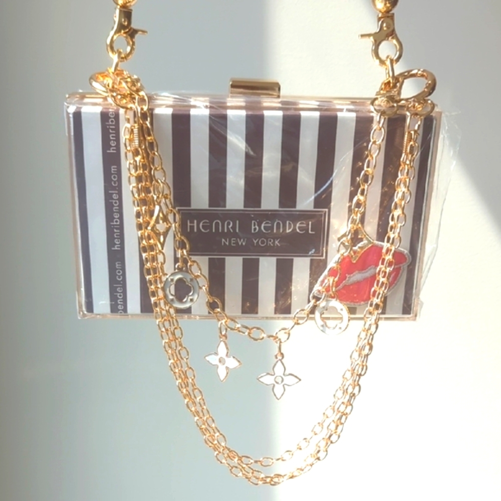 Henri Bendel Upcycled Paper Shopping Bag Acrylic Clutch